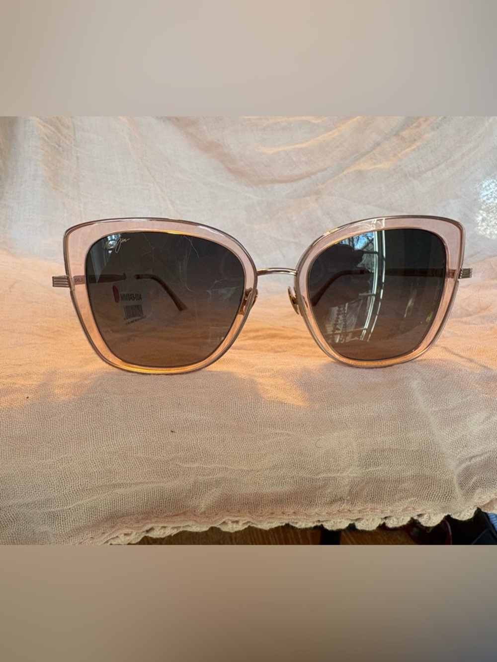 Maui Jim violet lake transparent pink with rose gold. Bronze lenses.